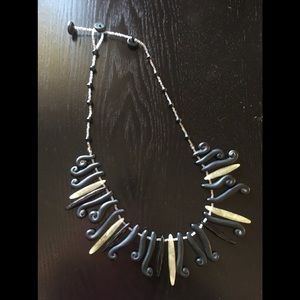 Beaded ladies necklace, brown and clear button closure